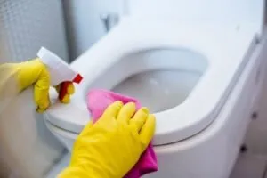 What causes black spots in toilet bowl