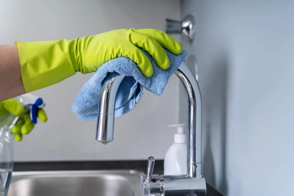 How do you clean tarnished shower fixtures