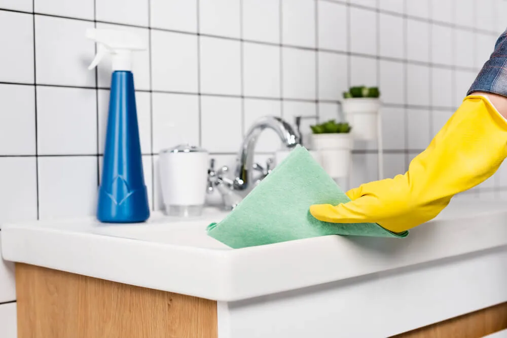 What DIY solutions are useful for bathroom cleaning