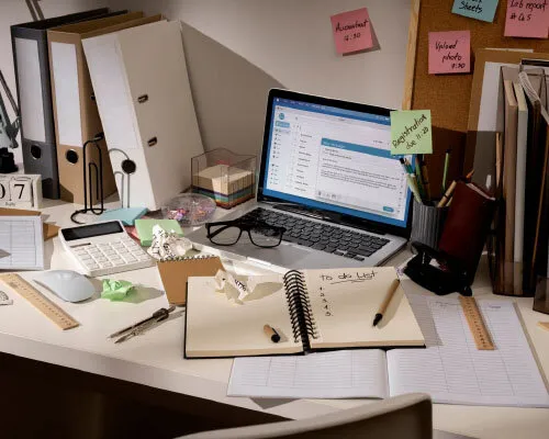 cluttered workspace