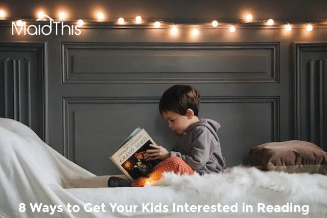 kid reading in bed