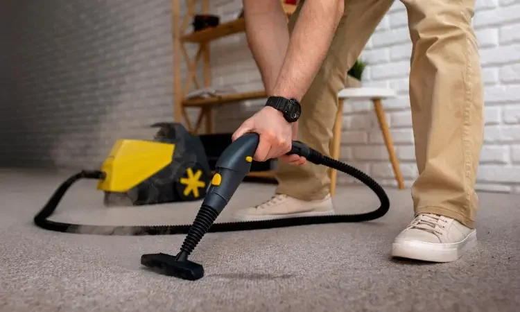 Vacuuming carpet