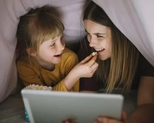 Watching movies after cleaning with a kid