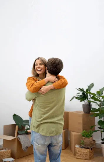 happy couple moving in